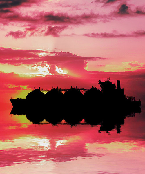 Silhouette of a LNG tanker on water.